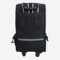 Back view of Petique 5-in-1 dog carrier featuring pocket which slips over luggage handle.