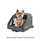 Petote Rio Classic dog carrier carry-on luggage with a small terrier dog sitting inside the bag.