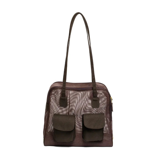 Canine Styles beige modern dog carrier made of see through mesh in brown and canvas trim. Over the shoulder pet purse with two front pockets.