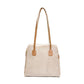 Back of the Canine Styles dog carrier in beige mesh with beige leather shoulder straps.