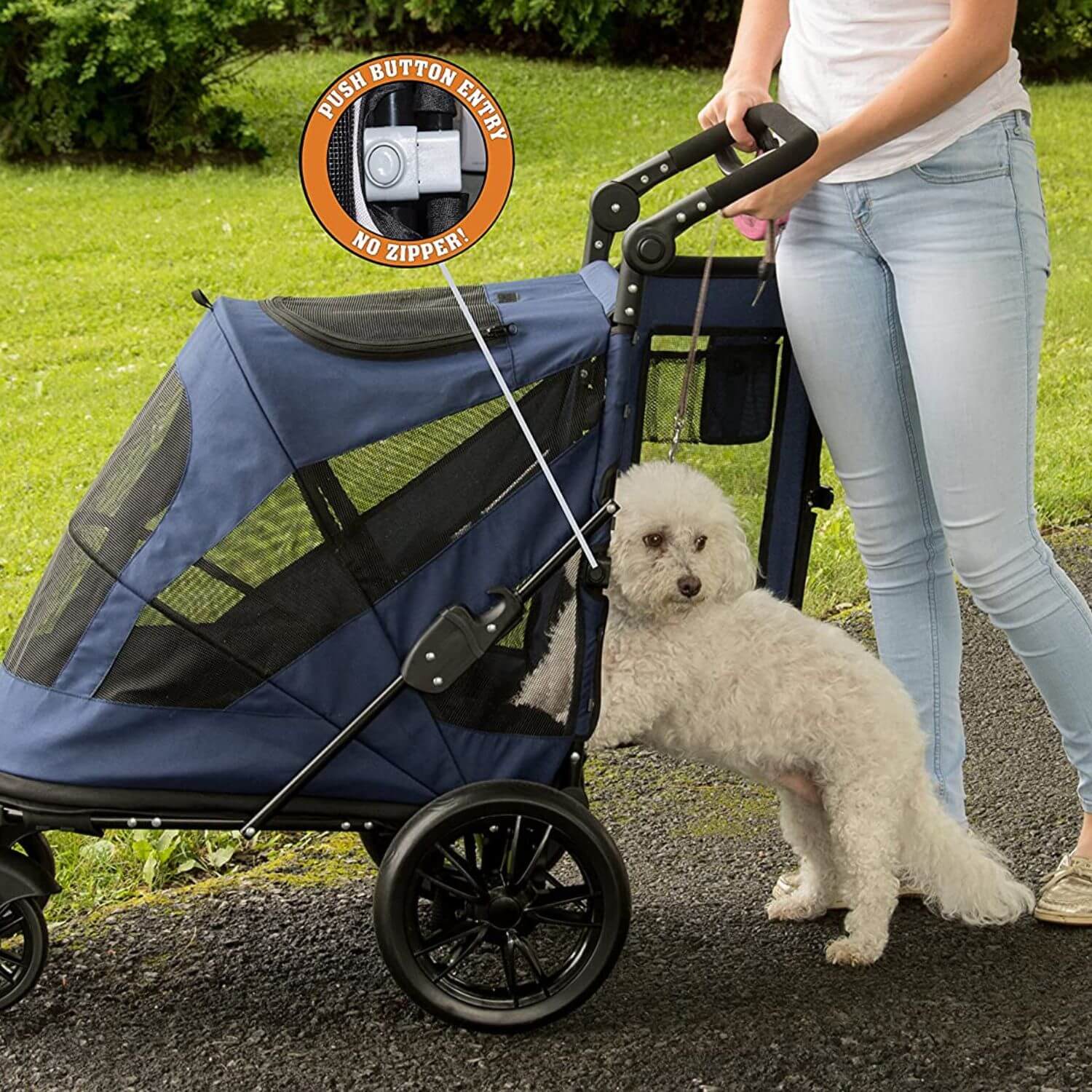 Small dog stepping into the Pet Gear Excursion dog stroller.