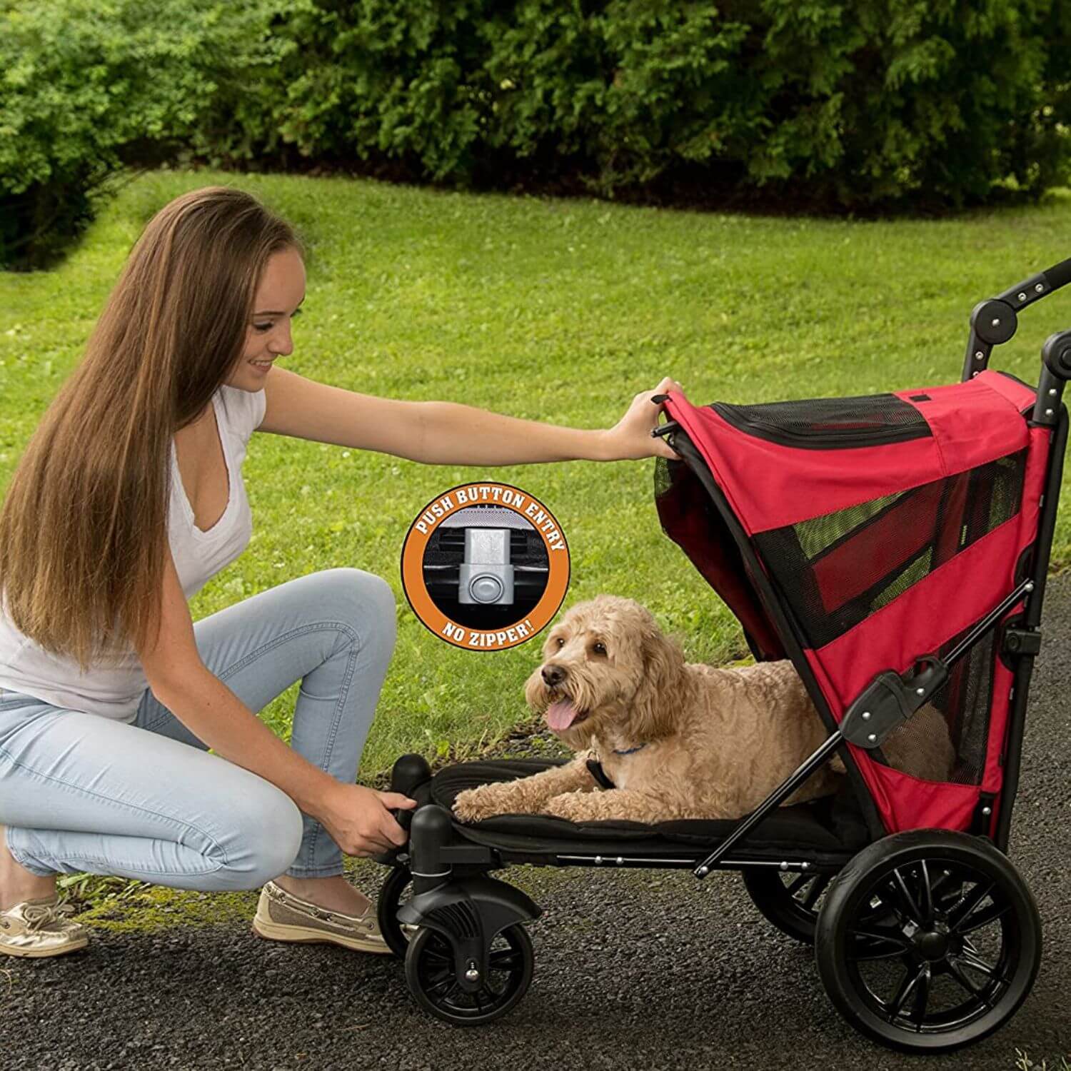 Person opening the canopy of the Pet Gear Excursion dog stroller with a push of a button.