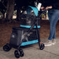 Person walking with their cat and dog inside the Petique Double Decker stroller.