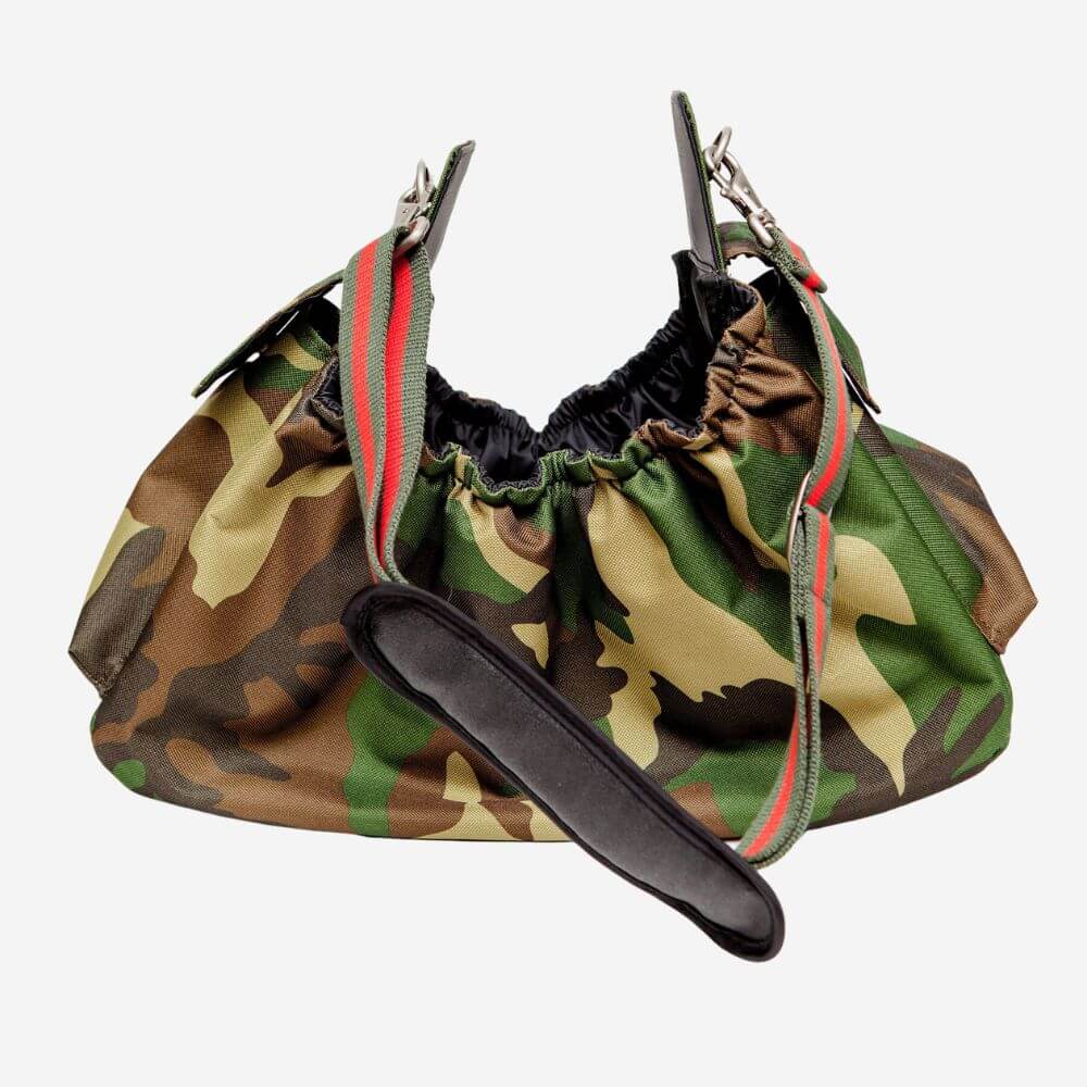 Petote Gigi sling modern dog carrier in green camo and red strip.