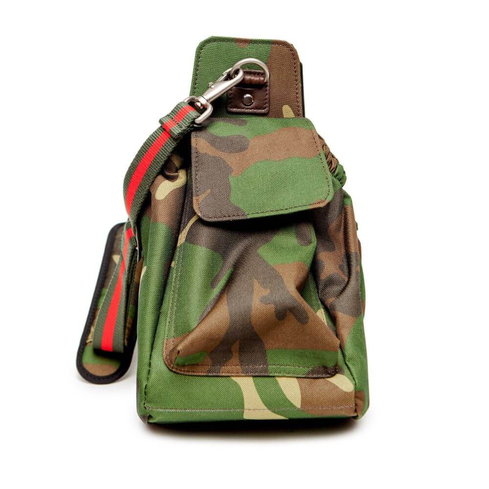 Side pocket Petote Gigi sling modern dog carrier in green camo.